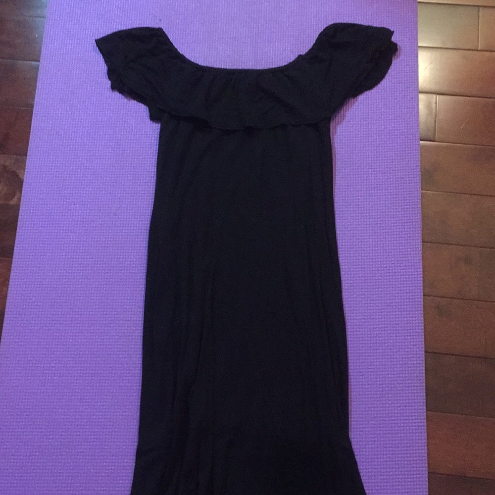 Plain black off the shoulder dress.